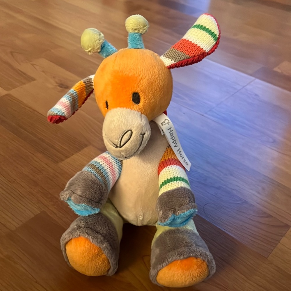 Like new Happy Horse multi colored giraffe stuffed animal